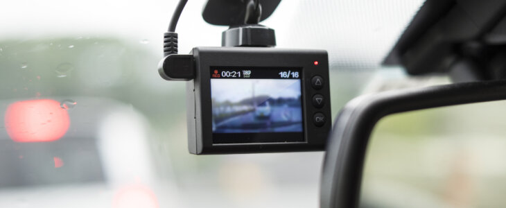 Dash cam mounted on a car windshield